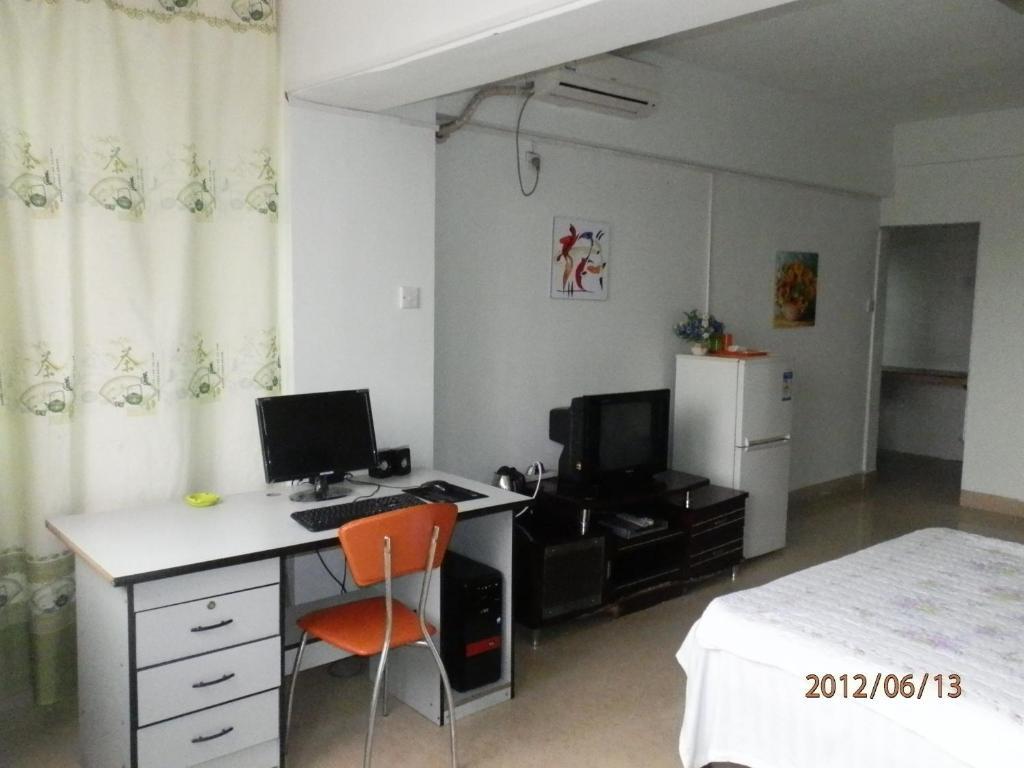 Xingfu Hotel Наньнин Номер фото